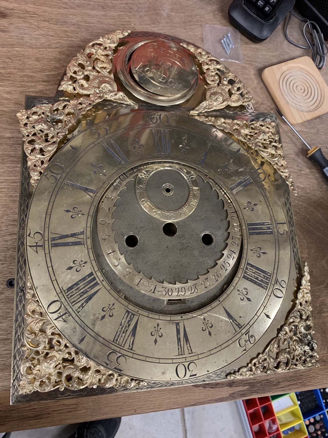 Dial silvering restoring an antique brass clock dial