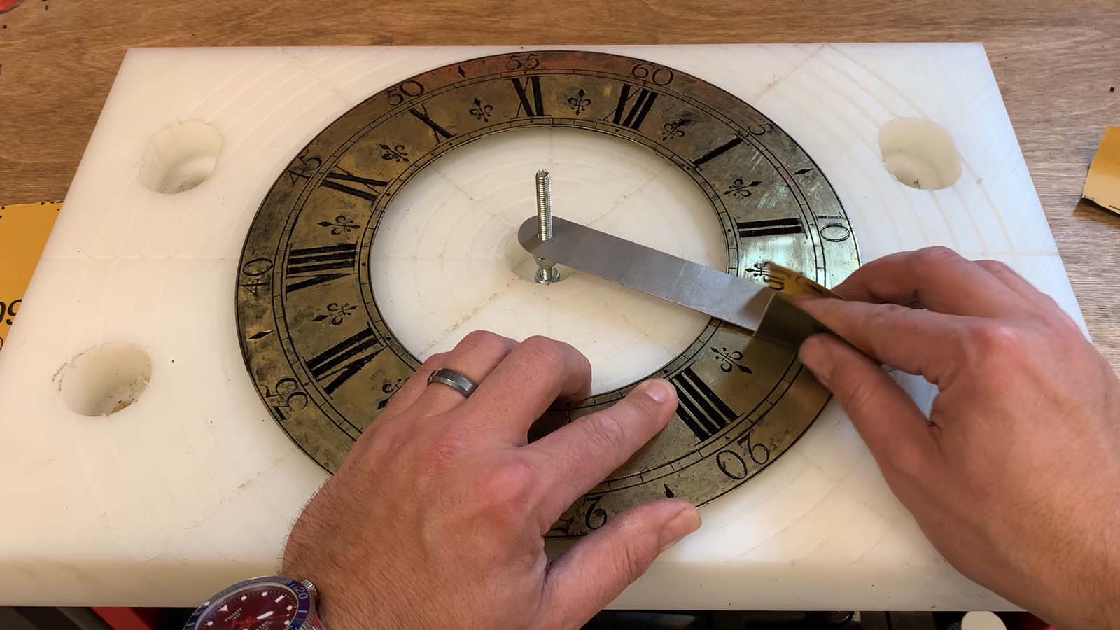 Dial silvering restoring an antique brass clock dial